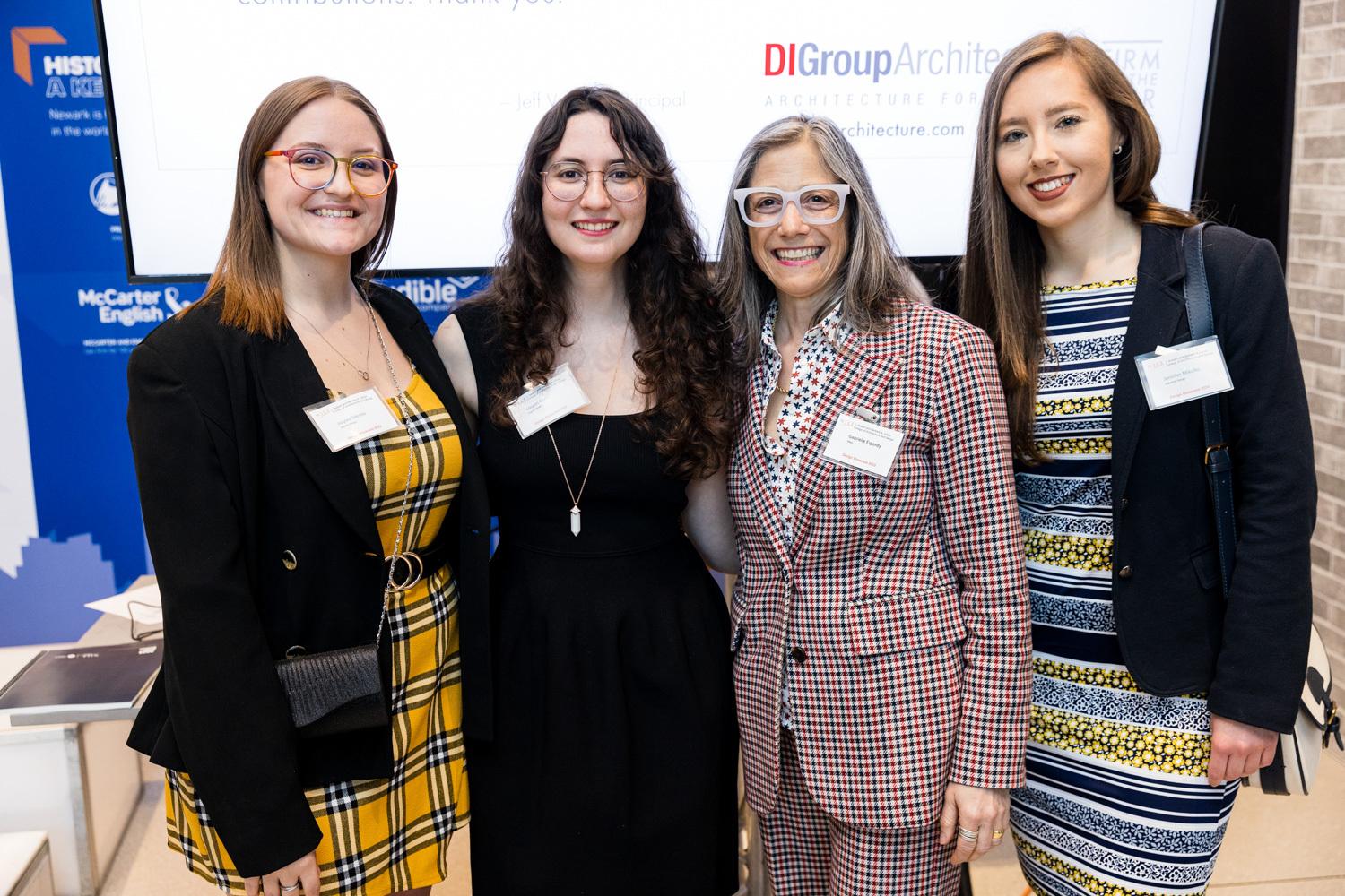 Design Showcase winners from left to right, Haylee Merola, Megan Krutz and Jennifer Mikulko with interim dean Gabrielle Esperdy.