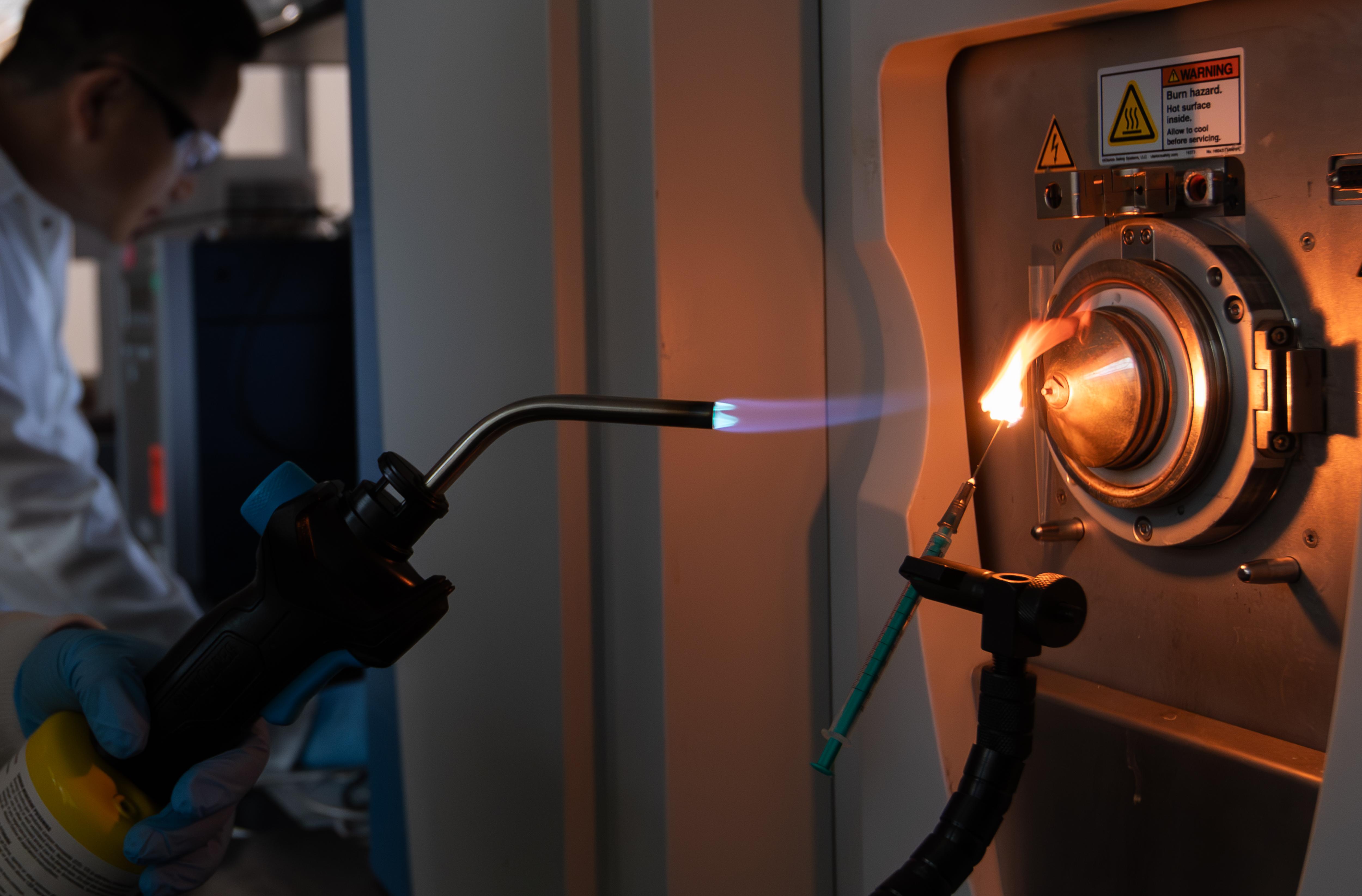 FI-MS uses a small open flame to simultaneously break down and ionize plastic particles at the point of analysis.