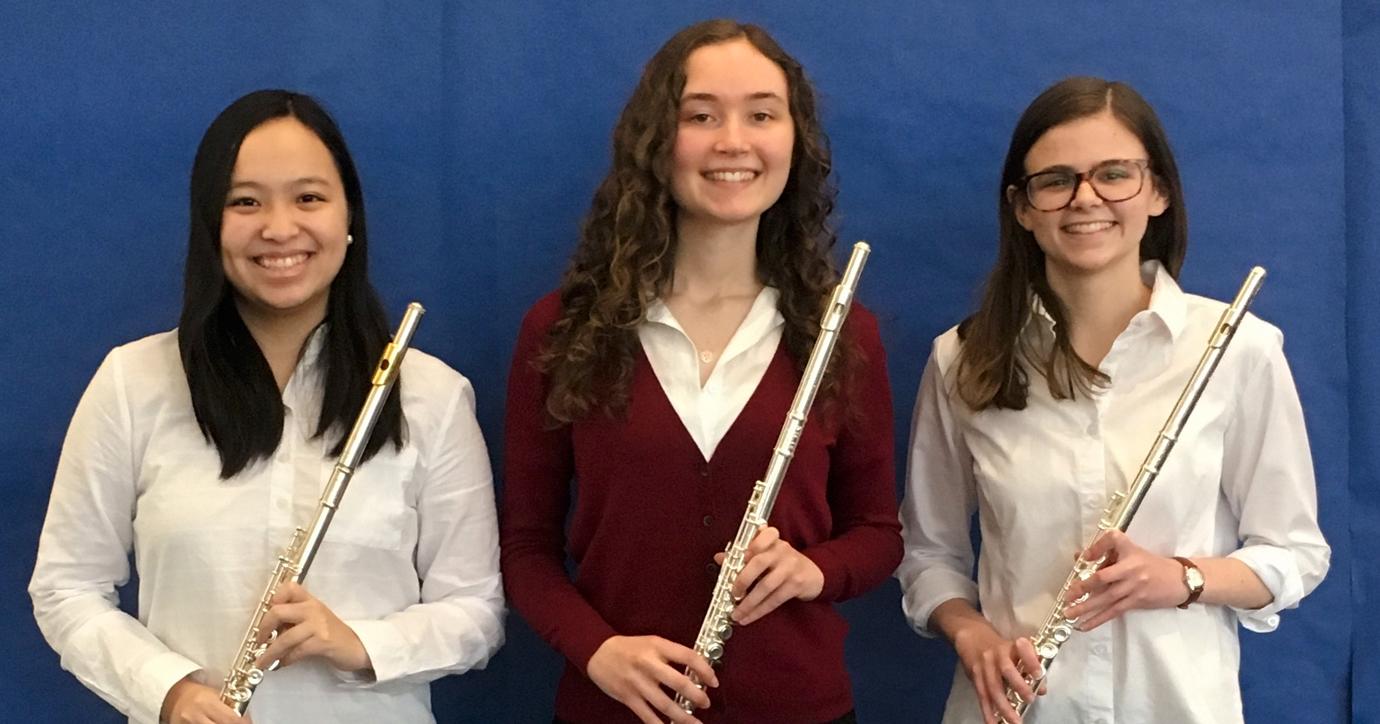 Musical friends Kristianna Gaw (L) and Emily Jensen (R) also graduated this year. 