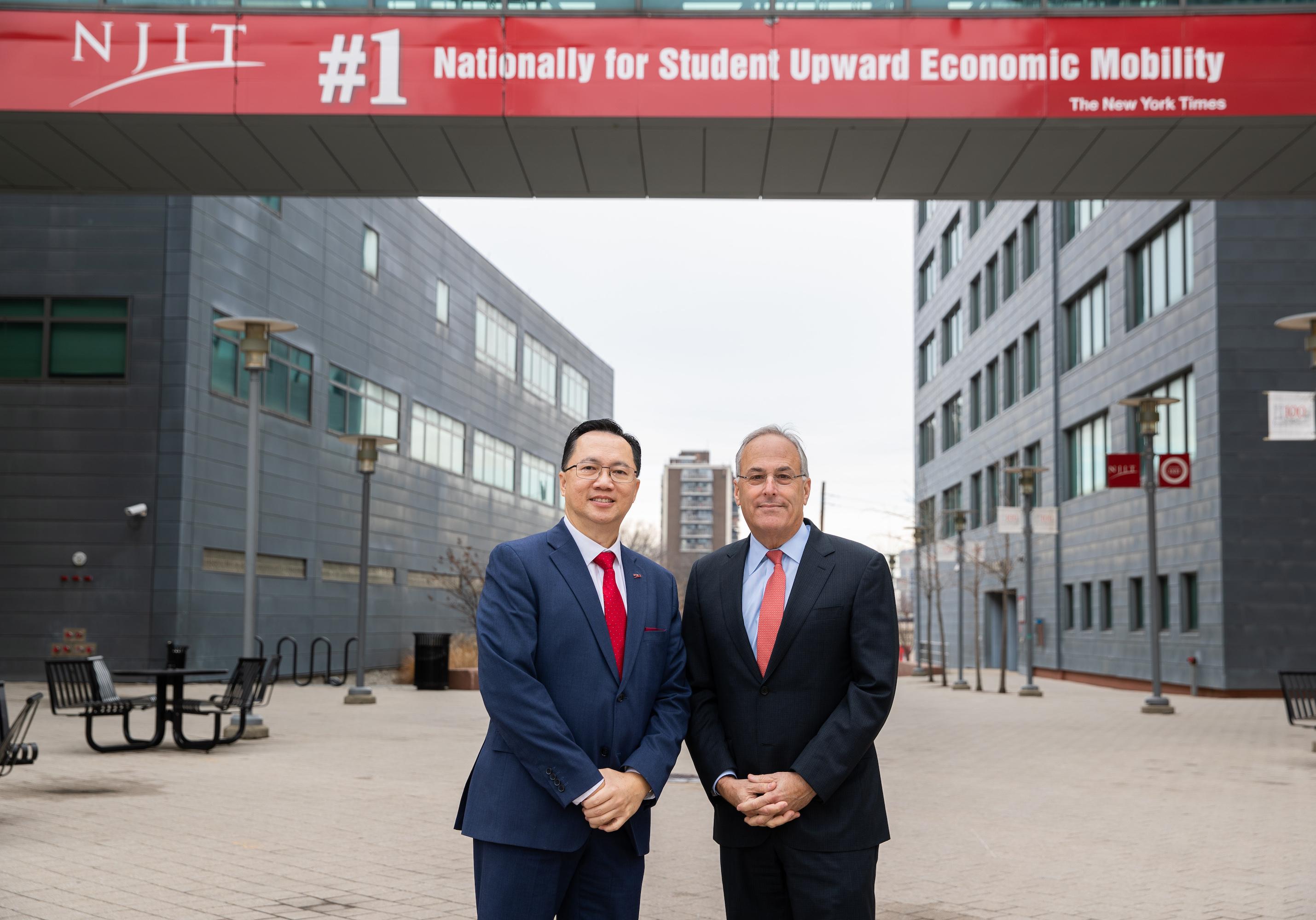 Dr. Teik Lim and chair of the Board of Trustees Robert Cohen