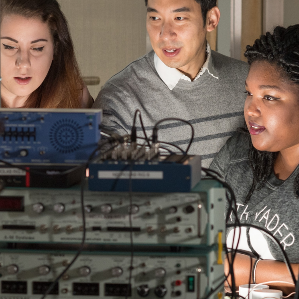 Professor Mike Lee engages with students