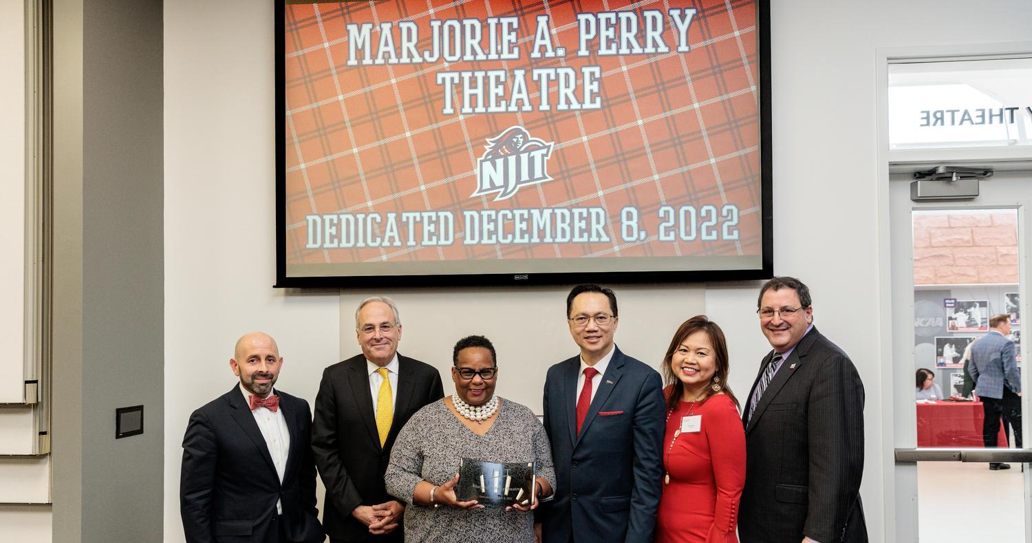 (L to R) Alexo, Board of Trustees Chair Robert Cohen, Perry, President Teik C. Lim, Gina Lim and Director of Athletics Lenny Kaplan
