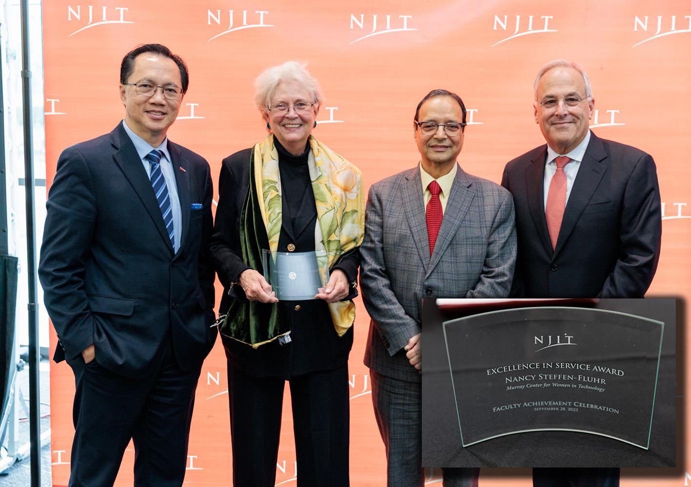 Nancy Steffen-Fluhr, associate professor in humanities and director of the Murray Center for Women in Technology, accepting the Overseers Excellence in Service Award. Steffen-Fluhr is part of a recently awarded $1.25M NSF grant to ensure women scholars flourish as inventors. 