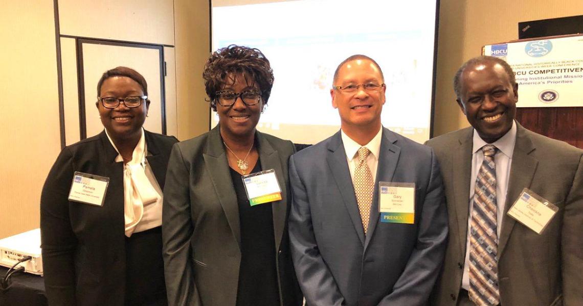 At the HBCU conference (from left) Pamela Obiomon, Prairie View A&M University; Valinda Kennedy, IBM-Midwest; Gary Schneider, IBM; Cheickna Sylla, NJIT 