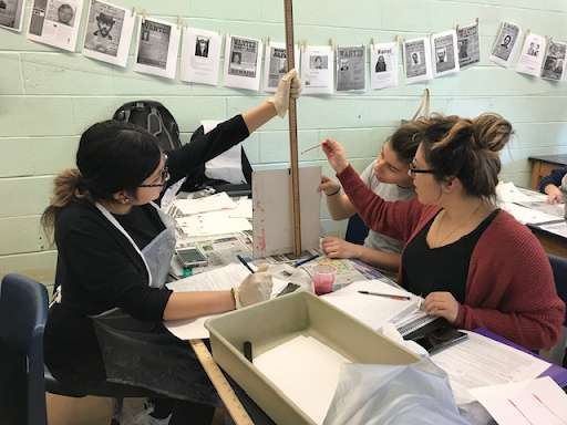 Carman’s students conduct a blood spatter experiment to determine how different surface angles affect the size and shape of a blood droplet.